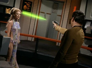 Deela dodges a phaser beam