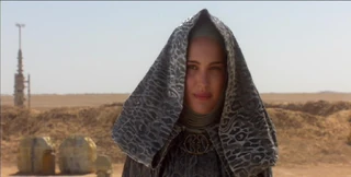 Padme greets 3PO on Tatooine