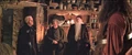 Hagrid's hut with visitors Malfoy Fudge Dumbledore.jpg