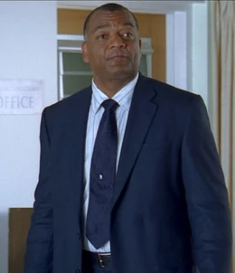 3x22 funeral director.jpg