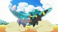 EP607 Glameow y Umbreon usando ataque rápido