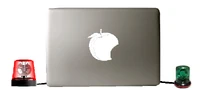 Leaked image of the back of Director Benny's laptop, with the mystical buttons. Yes, Benny uses Peach.