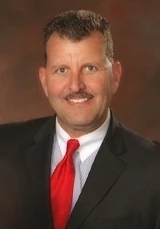 Mark E