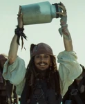 Jack Holding Up Jar of Dirt