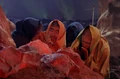 Enterprise crew warming at a heated rock.jpg