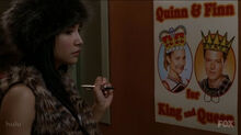 Santana vandalizing quinns poster