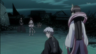 Tobiume explains Ashisogi Jizo's ability to Isane, as Iba watches on