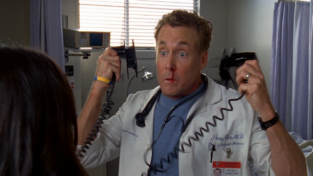 IMAGE: http://images1.wikia.nocookie.net/__cb20110528203557/scrubs/images/thumb/c/c5/8x1_Cox_defibrillator_1.PNG/640px-8x1_Cox_defibrillator_1.PNG