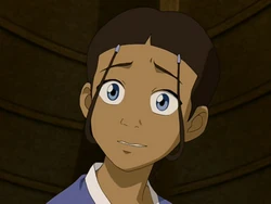 Katara smiles awkwardly