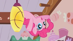 Pinkie Pie behind a ceiling lamp in Cupcakes song S1E12