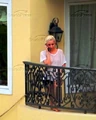 11-26-09 On her hotel balcony