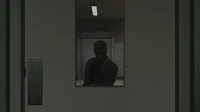 Mitchell behind the Morgue's Door