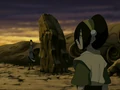 Toph nearly crushing Sokka.png