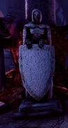 Statue holding shield