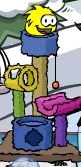 Yellow puffle playing with his items.png (11 KB) Yellow puffle playing with his items