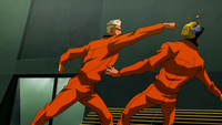 Superboy punches Ojo
