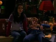 CarlyshiftingonthecouchstillclosetoSam