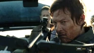 Daryl about to shoot the walker on the highway