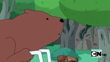 S4 E7 Bear passing by a ruined building