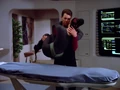 Riker delivers Troi to sickbay.jpg