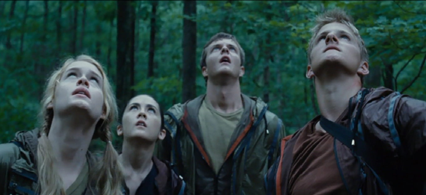 The Careers (Glimmer, Clove, Marvel and Cato) attempting to kill