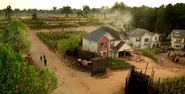 Charlie, Maggie, and Aaron leave the village