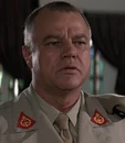 Brad Whitaker (Joe Don Baker)