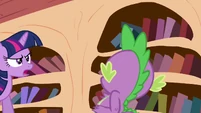 Spike backing away from Twilight S3E01