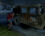 Civilian vandalizing Humvee BOII