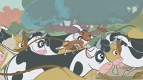 Winona riding a cow S1E04