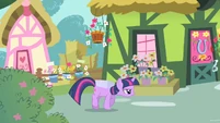 Twilight walking suspiciously with box S1E25