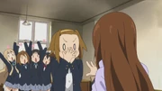 Ritsu eating paper
