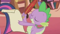 Spike preparing to write S1E3