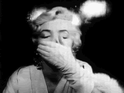 MARILYNMONROEBLOWINGAKISSGIFANIME