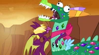 A dragon hugs Twilight in the dragon costume S2E21