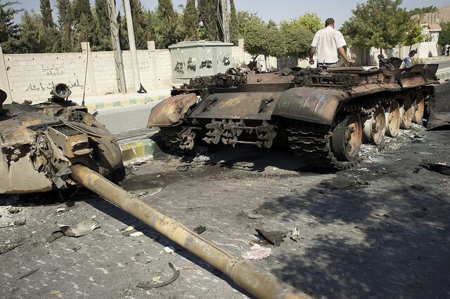 http://images1.wikia.nocookie.net/__cb20130303071527/althistory/images/thumb/3/3f/Syrian_tank_in_Aleppo_destroyed_by_NATO_aircraft_(SIADD).jpg/640px-Syrian_tank_in_Aleppo_destroyed_by_NATO_aircraft_(SIADD).jpg
