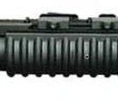 M203