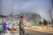Bird's Nest Stadium in Beijing, artist rendering with guard.
