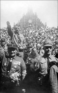 Adolf Hitler, behind Hermann Göring, at a Nazi rally in Nürnberg in 1928.