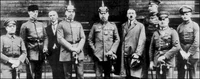 The leaders of the Beer Hall Putsch, 1923, awaiting trial (left to right): Heinz Pernet, Friedrich Weber, Wilhelm Frick, Hermann Kriebel, Erich Ludendorff, Adolf Hitler, Wilhelm Brückner, Ernst Röhm, Robert Heinrich Wagner.