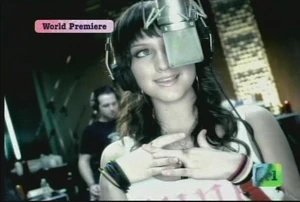 Ashlee singing in the studio in the "Pieces of Me" video
