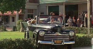 Biff and his goons in the Ford.