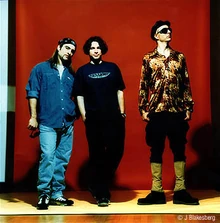 Primus, left to right: Tim Alexander, Larry LaLonde, Les Claypool,  in a promo picture circa 1995.(photo by Jay Blakesberg ©)