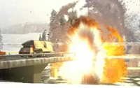 A bridge with a Nod Convoy on it being destroyed by some GDI Hover MLRS