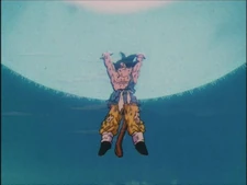 Goku charges the Universal Spirit Bomb.