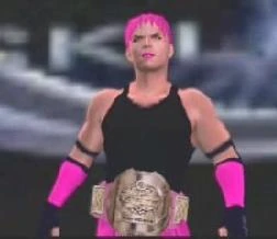 JTX wearing pink Hardcore Title belt.