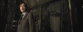 Thewlis, as Lupin, stands anxiously in the Shrieking Shack in Harry Potter and the Prisoner of Azkaban (film).