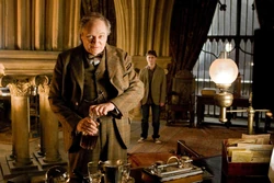 Horace Slughorn with Harry Potter.