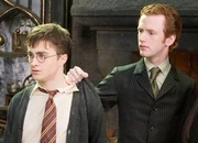 Percy with Harry Potter in Dumbledore's office.