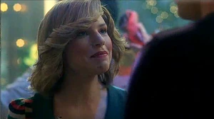 Copy girl Nancy Stokes, played by Eryn Joslyn, talks with Dan at a Christmas party in 1979.